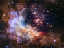 A bright cluster of stars and glowing gas