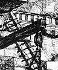 A black-and-white line drawing of stairways and confusing architecture.